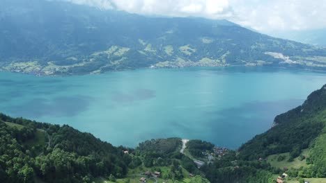 tranquil waters of lake thun: breathtaking 4k aerial view of the swiss alps and alpine flora in the heart of nature