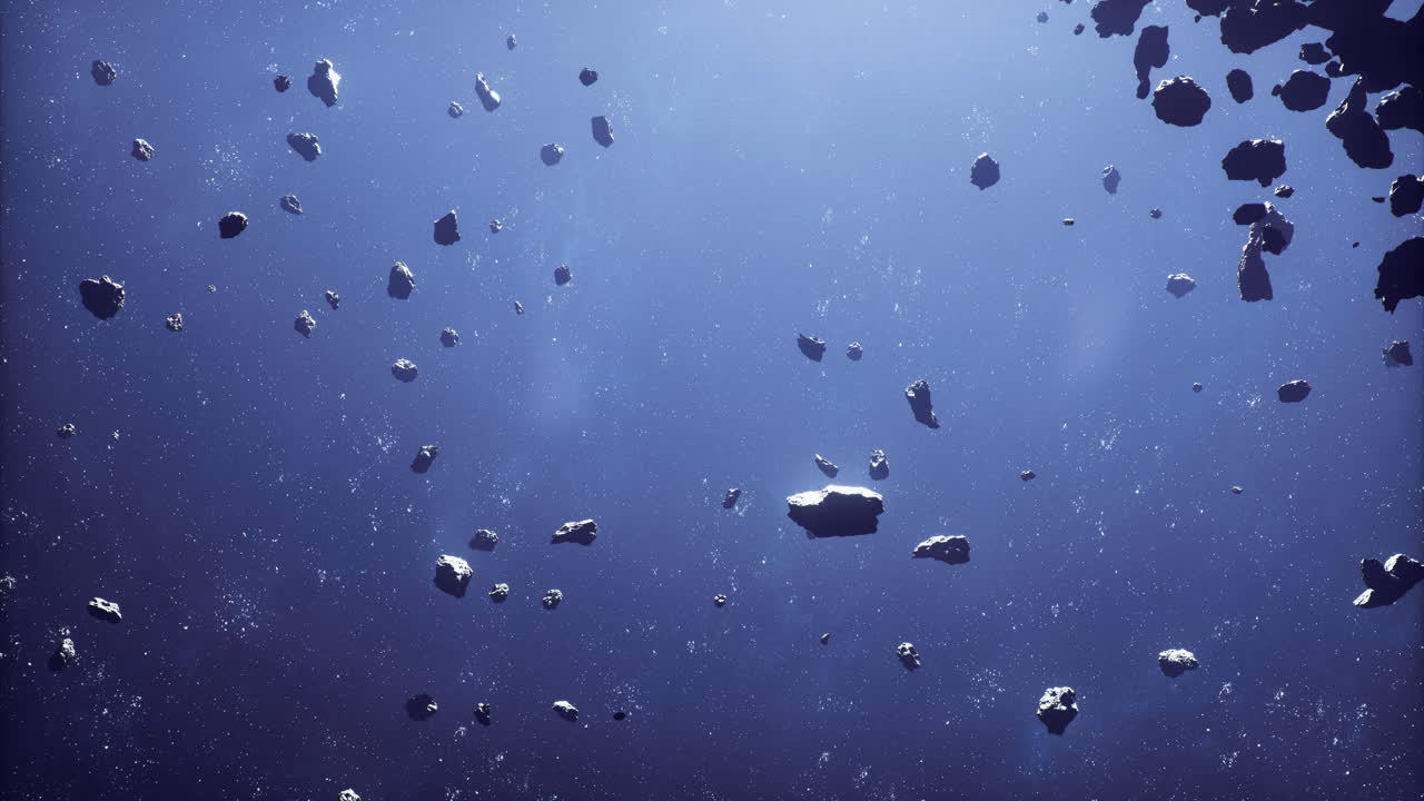 Expansive view of numerous asteroids floating in deep space