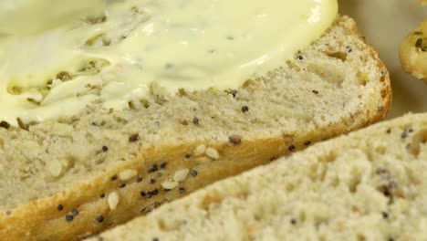 spreading aioli, garlic white sauce into bread