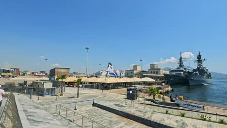 boats and people at naples harbor