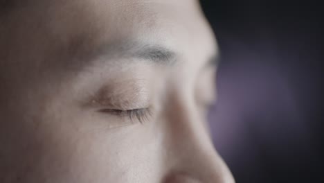 close-up of a person's eyes and face