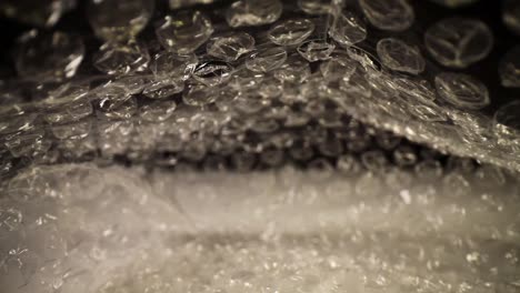 pushing into a bubble wrap bag all the way to the end, top of the bag bounces slightly