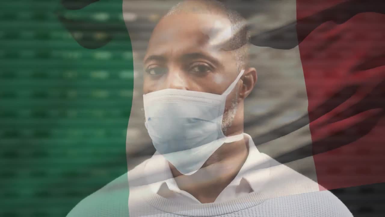 코로나 19 대유행 기간 동안 얼굴 마스크를 착용한 남자가 이탈리아 국기를 흔들고 있는 애니메이션