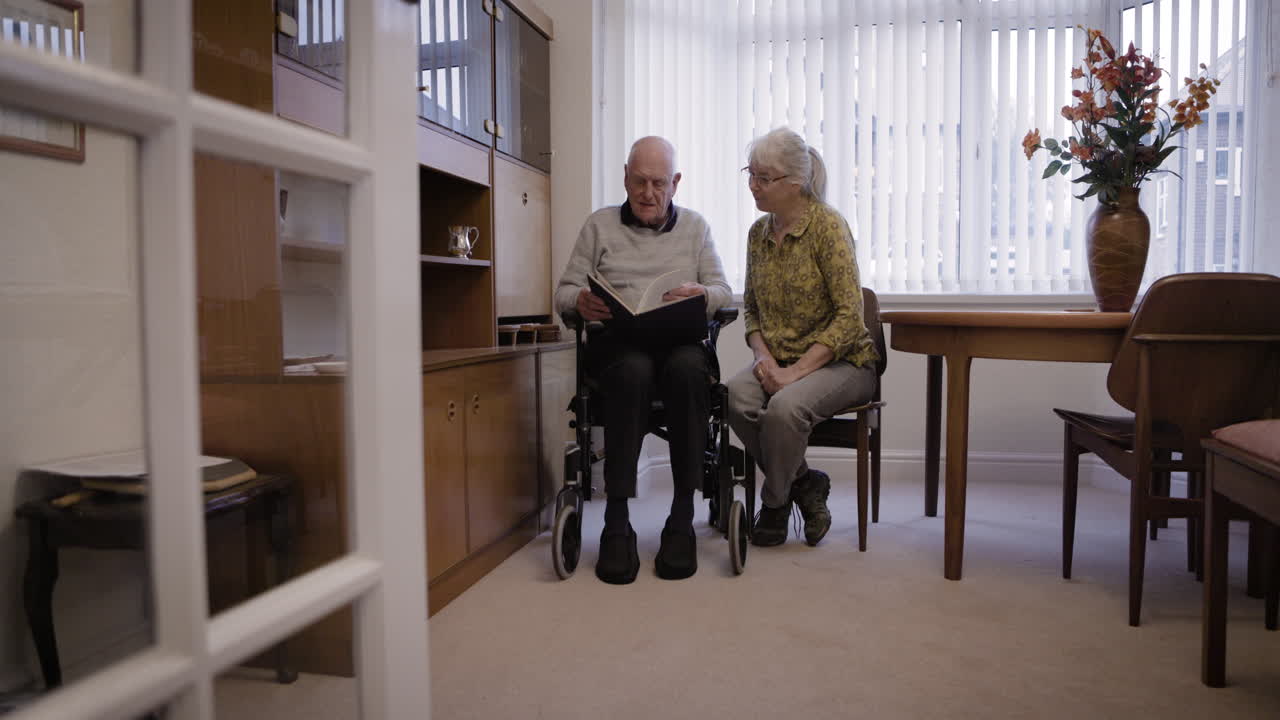 Elderly Couple Reading in Living Room