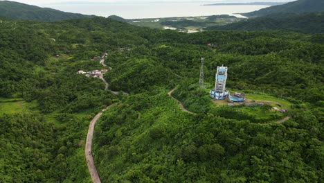 dense tropical mountains near pagasa virac radar station in buenavista, bato, catanduanes, philippines. aerial drone shot