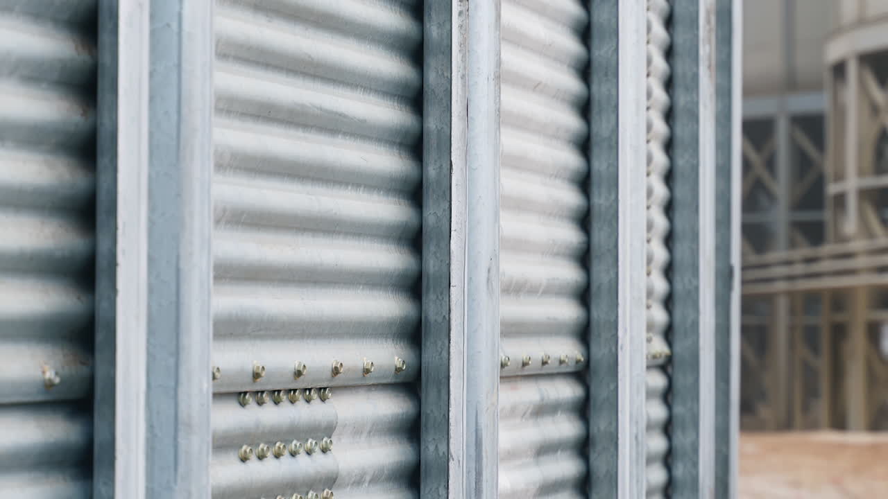 Industrial metal agricultural equipment. Close up view factory elevator construction.