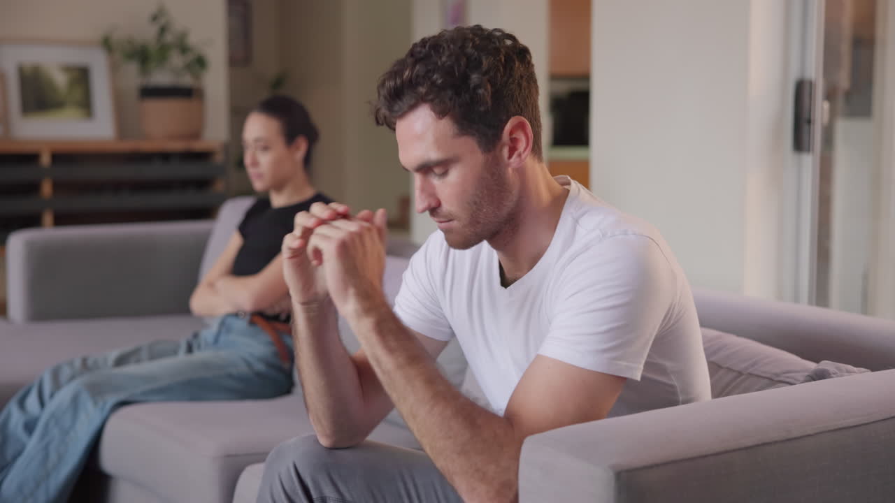 Couple, stress and depression of divorce on sofa