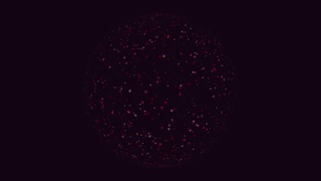 a spherical structure composed of numerous red dots aligned in a circular arrangement. the purpose or symbolism remains unclear without further context provided