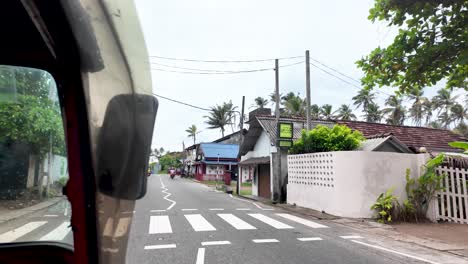 sri lankan street scene: motorbikes, rickshaws and daily life
