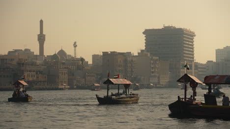 dubai creek dhow boats at sunset