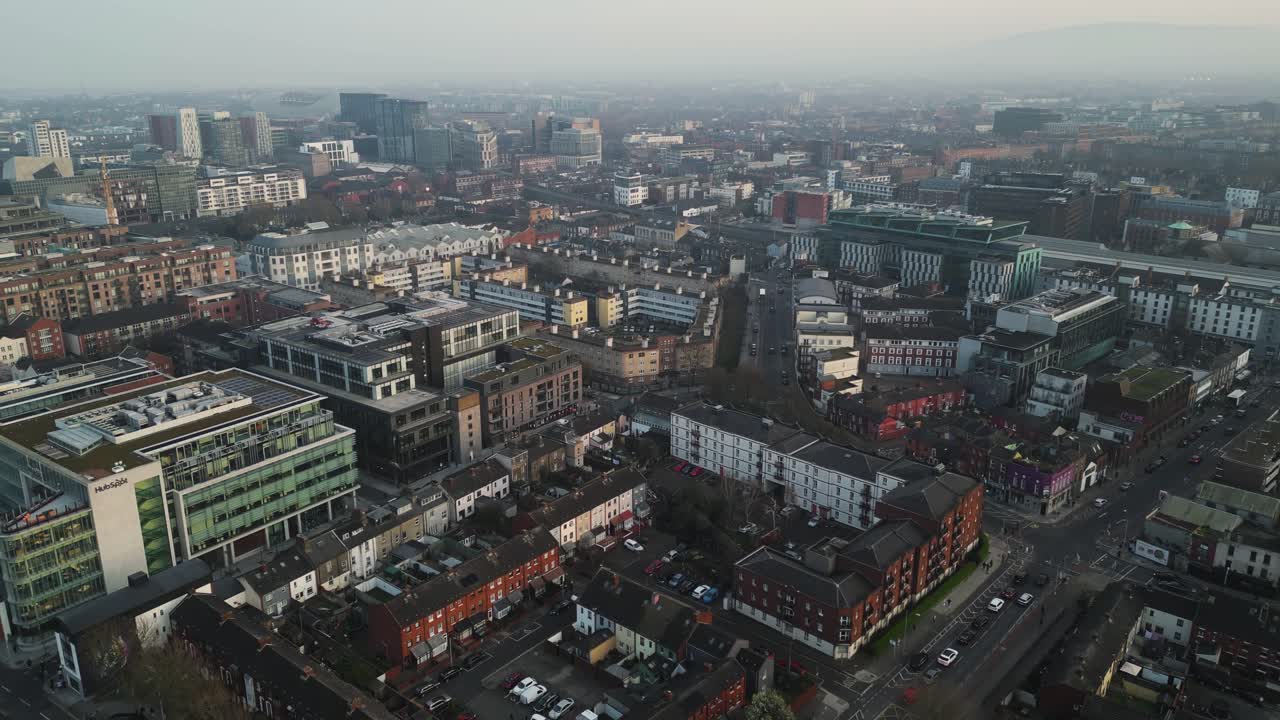 panoramic aerial view of a residencial area of Dublin, popular brick flat buildings surrounded by modern buildings in Docklands - Dublin, Ireland