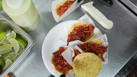 filling soft taco shells with pulled pork - food truck series