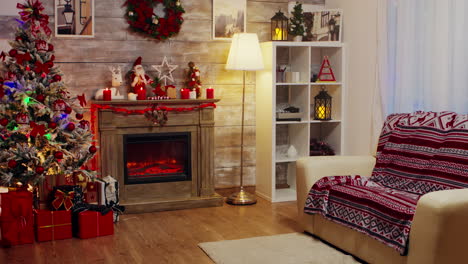 zoom in shot of candles burning on top of fireplace