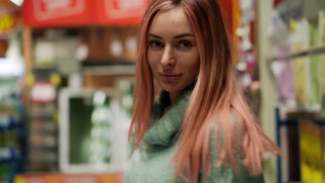 Portrait-Of-A-Woman-Walking-In-Hardware-Store,-Looking-At-Camera