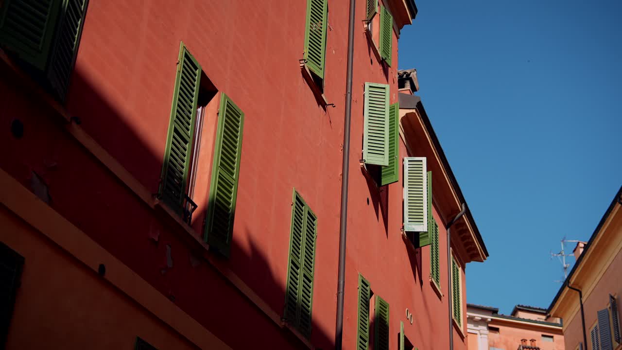 Italian Building with Green Shutters