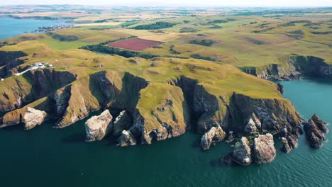 The-Rugged-Cliffside-Beauty-and-Majestic-Coastline-of-St-Abbs-Head-Aerial-View,-Scotland,-United-Kingdom