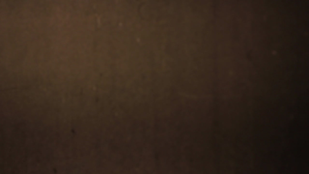 Dark Brown Textured Background with Vintage Film Grain