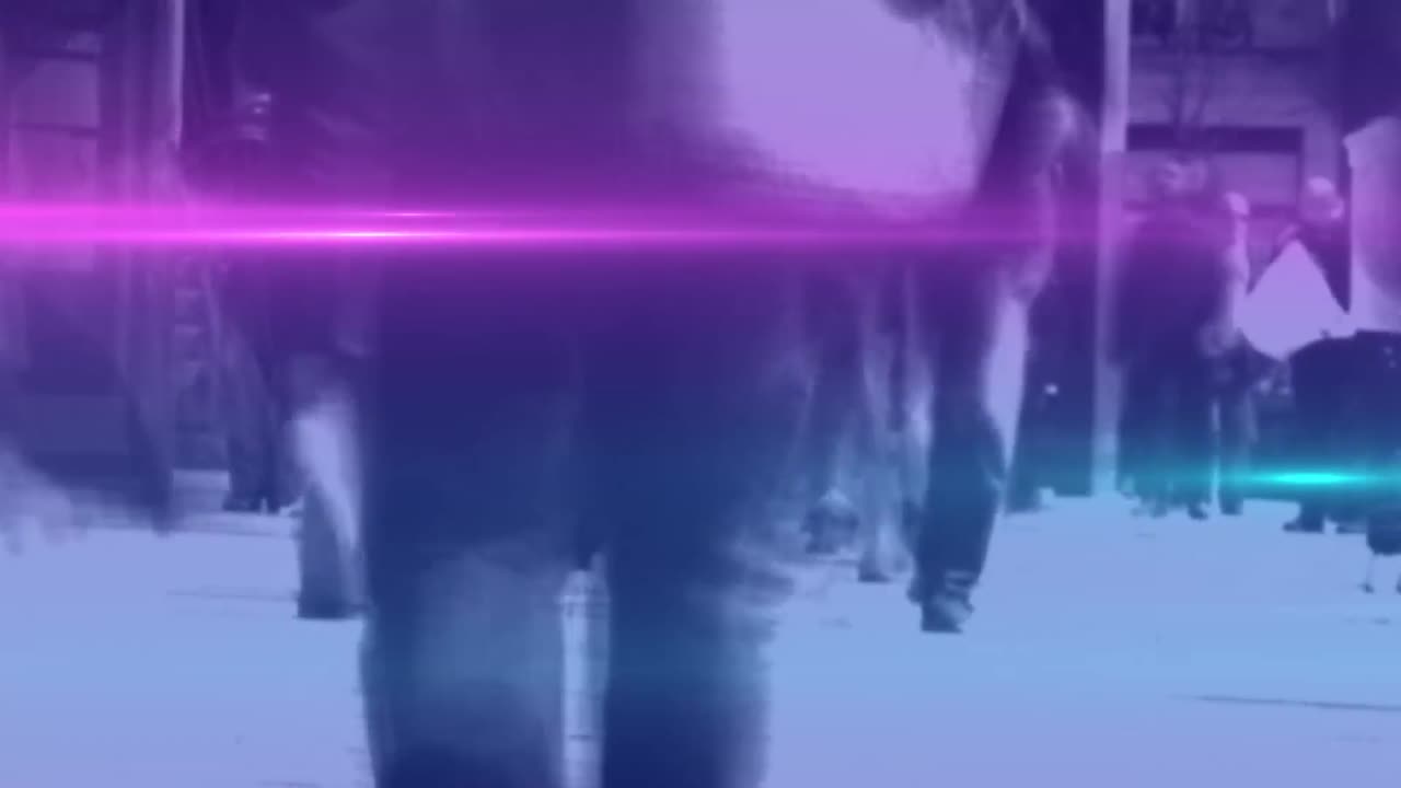 Video of coloured lights over crowd walking to work in street