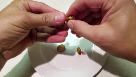 Shelling and eating pistachios