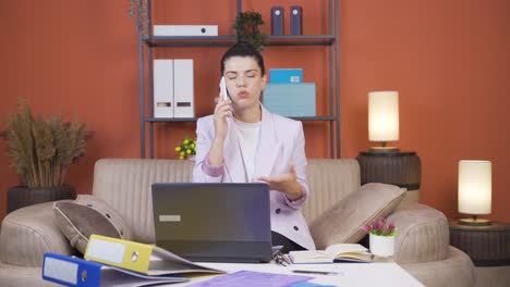 home office worker young woman is angry and furious