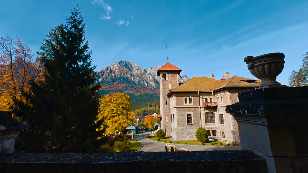 Lovely scenery of the old-fashioned house located in the picturesque landscape. Amazing autumn sunny day in mountains.