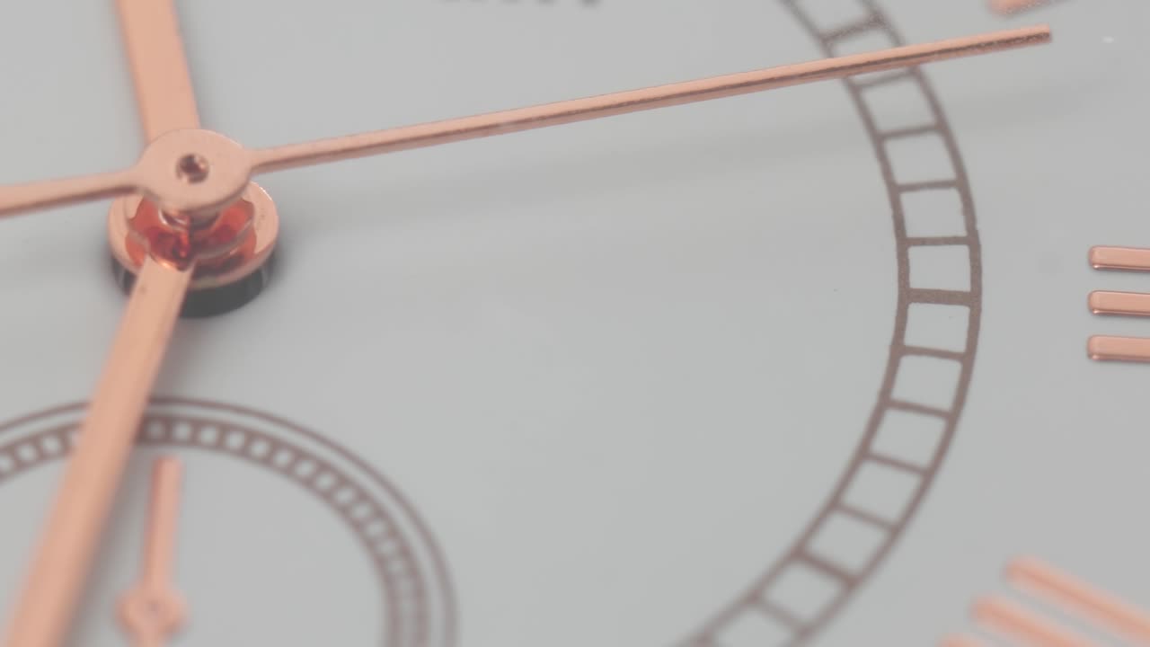 Analog wrist watch hands macro close up. Slider shot, real time, no people, 1:1 magnification