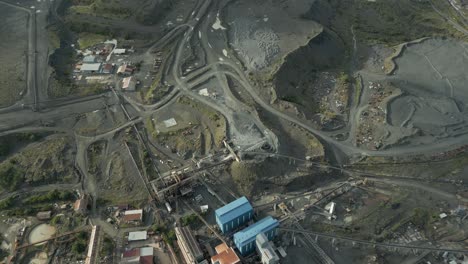 industrial landscape: diamond mine processing plant and tailings piles