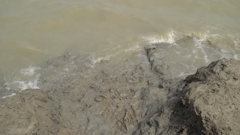 waves rolling on empty ganges banks