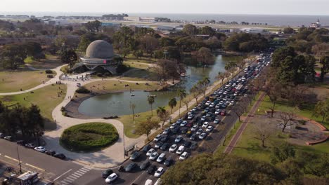 aerial view of traffic at highway around galileo galilei planetarium, parque tres de febrero, buenos aires, argentina