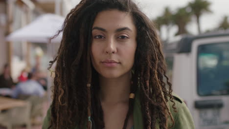 portrait of beautiful independent hispanic woman looking serious pensive thoughtful