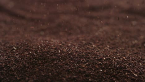 ground coffee falling in slow motion