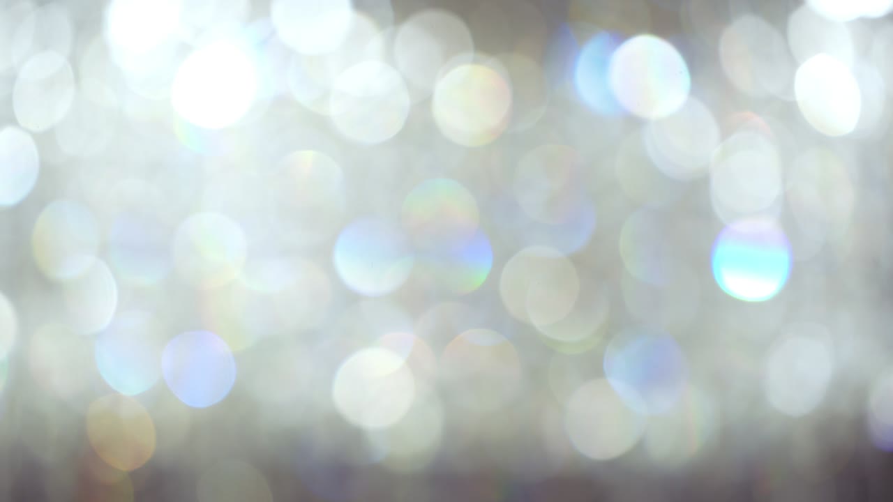 Abstract bokeh lights with soft light background, Bokeh blurred of Chrystal chandelier.