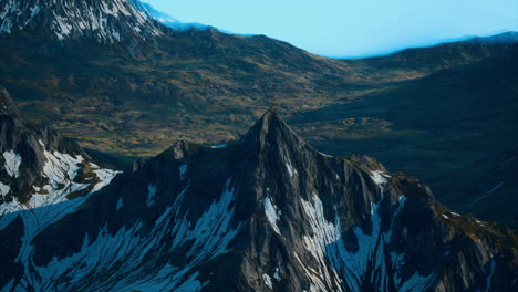 a majestic mountain peak with snow-capped slopes