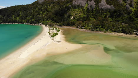 Turquoise-sea-water-and-mountains-drone-4k-New-Zealand