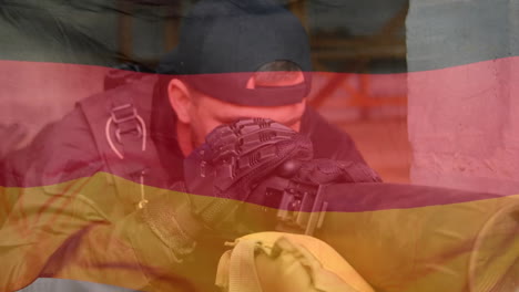 animation of flag of germany over caucasian male soldiers looking through binoculars