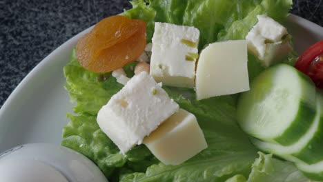 healthy salad with cheese and vegetables