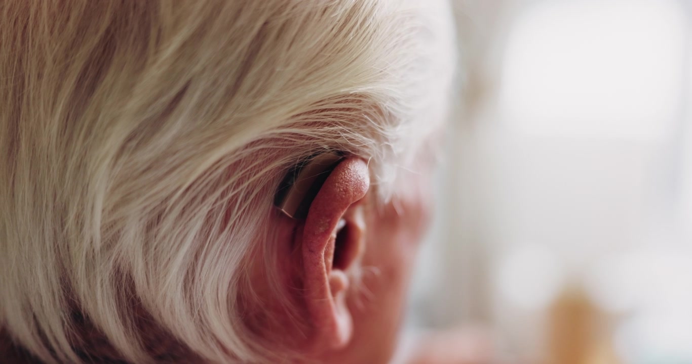 Close-up of Senior Person Wearing a Hearing Aid