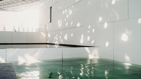 modern architecture with water feature and sunlight