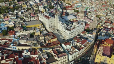 drone circles above university of guanajuato, mexico during daytime