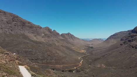 4x4-pickup-truck-driving-on-dirt-roads-on-mountain-passes-in-the-Cederberg-with-some-scenic-views-and-landscape