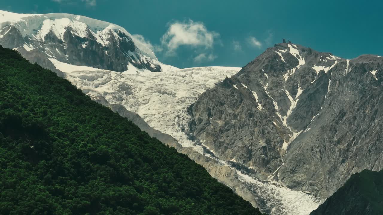 Majestic Devdoraki Glacier in Stepantsminda, Georgia under a clear sky