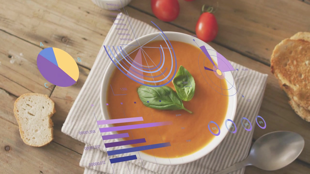 Infografiche che appaiono su zuppa di pomodoro, grafici che si trasformano mentre la telecamera zooma per evidenziare il basilico.