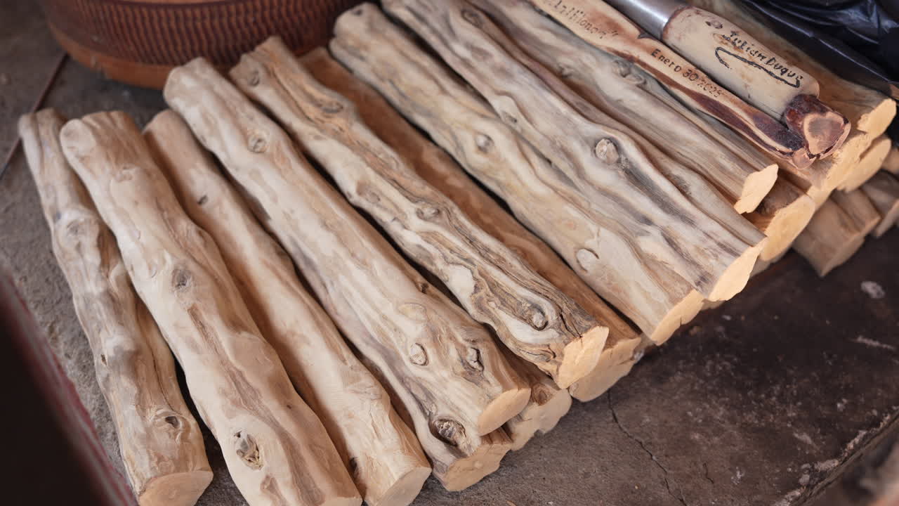 Detailed view of rustic firewood stacks, with unique textures and natural wood grain. Captured in soft lighting, highlighting the organic beauty and charm. Ideal for cozy, nature themes