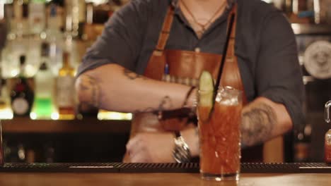 bartender preparing a bloody mary