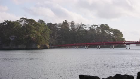 snow falling over matsushima bay, miyagi japan