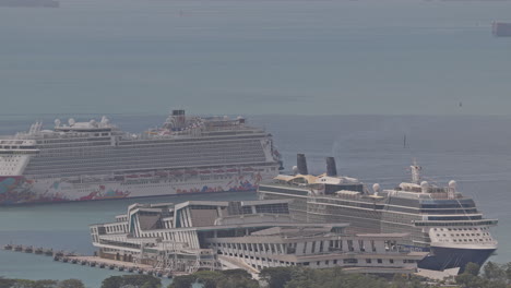 singapore - 5 march 2025 : container ships waiting in the sea by singapore