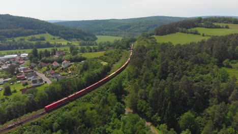 freight train working its way through countryside