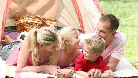 Family-camping-relaxing-on-the-grass