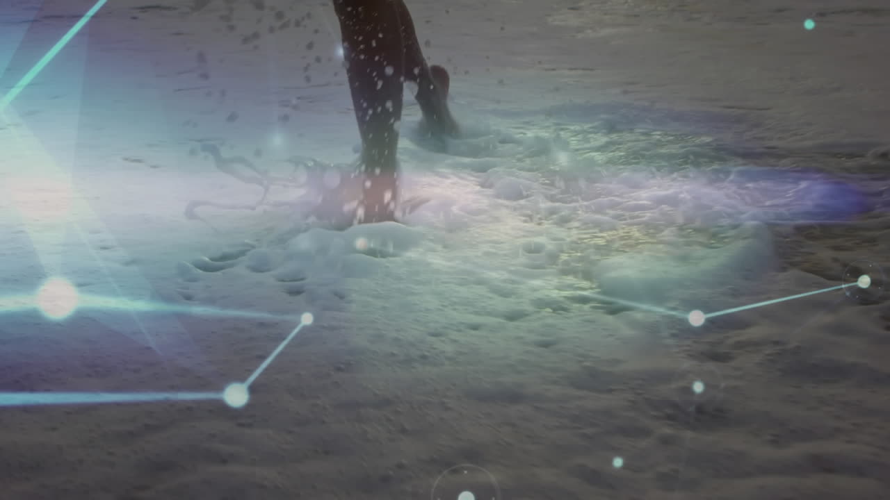 해변에서 달리는 여성의 낮은 섹션에 대한 연결의 반 ⁇ 이는 네트워크