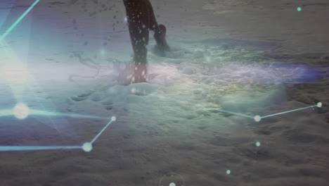 red brillante de conexiones contra la sección baja de una mujer corriendo en la playa